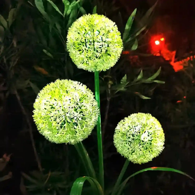 3-head RGB dandelion solar garden light for outdoor decoration.