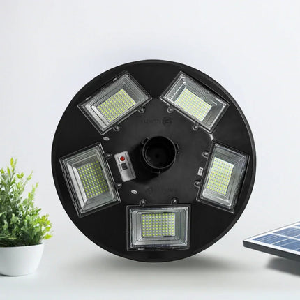 300 Watt Solar UFO Street Light for Home with motion sensor and waterproof outdoor LED lighting installed in residential driveway