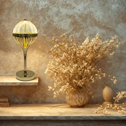 Decorative gold acrylic table lamp with USB power.