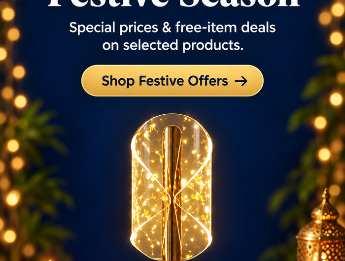 Futurkart festive offers banner featuring a glowing gold table lamp, lit diyas and special-price and free-item deals on selected products.