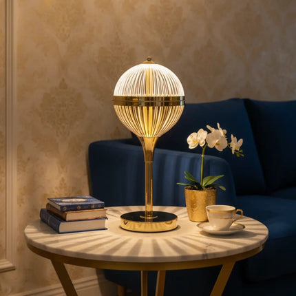 Modern gold acrylic LED table lamp for bedroom, living room and home décor.