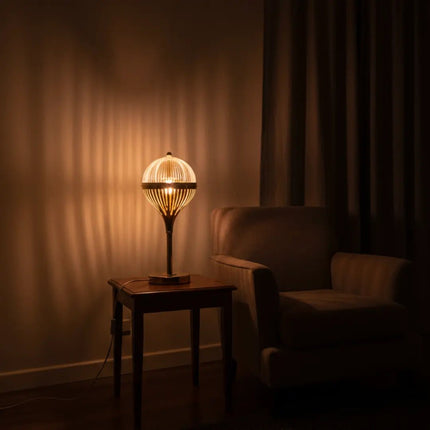 USB-powered rechargeable LED table lamp with elegant gold finish.