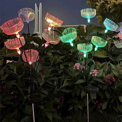 Six-headed jellyfish solar ground lamp with RGB LEDs for outdoor garden decoration.