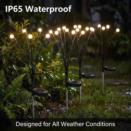 Pack of 2 solar firefly garden lights with warm white LEDs.
