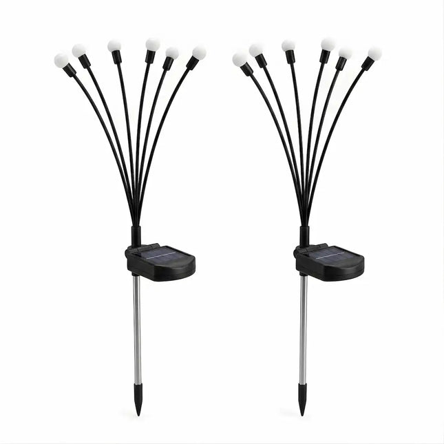 Solar firefly garden light with warm white glow.