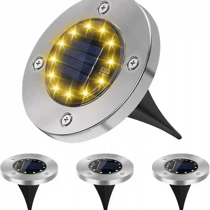 Solar in-ground disk light for outdoor garden and pathway lighting.