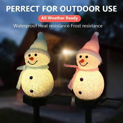 Solar snowman lawn decoration light for festive outdoor decor.