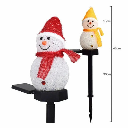 Warm white solar snowman garden lamp for Christmas outdoor decoration.